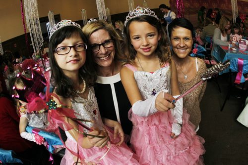 October 27, 2013 - 131027  -   (L to R) Chloe and her mom Marj Poirier are photographed with their friends Jerzy and Alli Minarik at the Princess for a Day festivities at the Canadian Mennonite University Sunday, October 27, 2013. Sixty young girls, some battling life-threatening illnesses, including six from the Childrens Wish Foundation, were crowned Princess for a Day as part of a unique fundraising event for the Childrens Wish Foundation at Canadian Mennonite University Sunday, October 27, 2013.