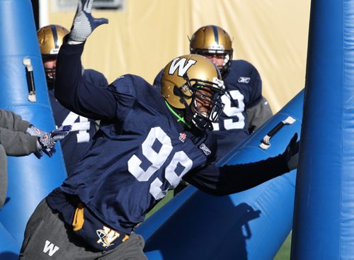 Winnipeg Blue Bombers J. D. Griggs runs a drill during practice at IGF in preparation for this Saturdays game against the Hamilton Tiger- Cats  If the Bombers lose they will be tied as the worst ever team in franchise history-See Paul Wiecek story- Oct 29, 2013   (JOE BRYKSA / WINNIPEG FREE PRESS)