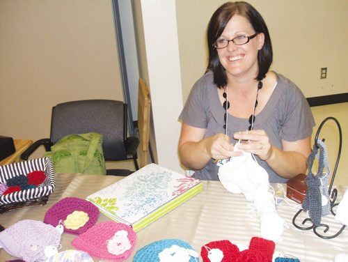 Canstar Community News Oct. 19, 2013 - Crocheted baby wear was featured at this booth at the 2013 Headingley Craft Sale. (ANDREA GEARY/CANSTAR COMMUNITY NEWS)