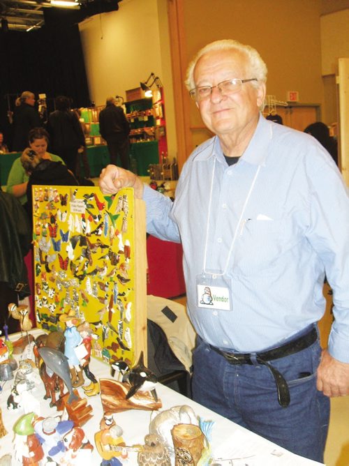 Canstar Community News Oct. 19, 2013 - Wood carver Fred Gross displays some of the unique fridge magnets he creates and was selling at this year's Headingley craft sale. (ANDREA GEARY/CANSTAR COMMUNITY NEWS)