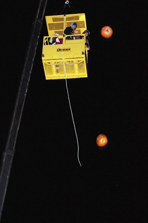 Canstar Community News The Jubilee Mennonite Church hosted a pumpkin fling event for Grade 6-12 students Friday evening that saw kids hoisted high up into the air with the help of two cranes, where they were challenged to send their pumpkins plummeting into a barrel filled with water down below. (JORDAN THOMPSON)