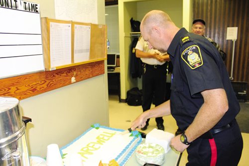 Canstar Community News Sgt. Kelly Dennison at the Lyle Street police station's cake and coffee event Wednesday afternoon. (JORDAN THOMPSON)