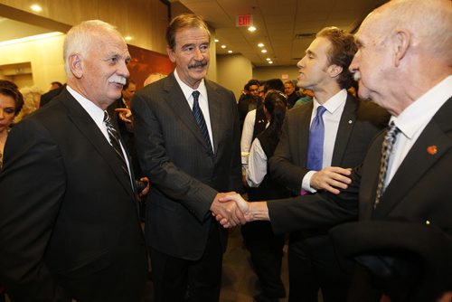 October 29, 2013 - 131029  - Former President of Mexico Vicente Fox is introduced to Vic Toews and Paul Robson by Craig Kielburger at We Day Dinner at The Radisson Tuesday, October 29, 2013. John Woods / Winnipeg Free Press