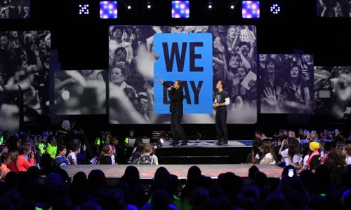 Co-founders Craig (right) and Marc Kielburger  at the WE DAY event in the MTS Centre Wednesday.  Wayne Glowacki / Winnipeg Free Press Oct. 30 2013