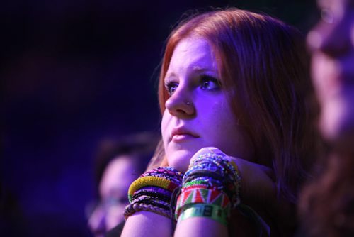 Brooklyn Van Renselaar wears a wrist full of bracelts that she got from her ME to We trip to Kenya with the Potash Corp that she went on with fellow students from Gilam school in northern Manitoba ,listens to the events on stage at the  3rd annual We Day events at MTS Centre Wednesday.   October 30,  2013 Ruth Bonneville / Winnipeg Free Press