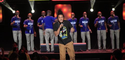 In front, Chris Tse and the Kenyan Boys Choir perform  at the the WE DAY event in the MTS Centre Wednesday.  Wayne Glowacki / Winnipeg Free Press Oct. 30 2013