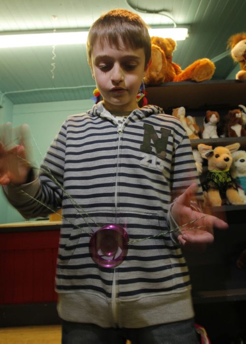 Newbridge Toy Store has started a yo yo night every Wednesday. Kids, teens and any adults interested in learning yo yo tricks are welcome to come down to the store and give 'er a try. In photo Leon Spivak does some tricks. BORIS MINKEVICH / WINNIPEG FREE PRESS  October 30, 2013
