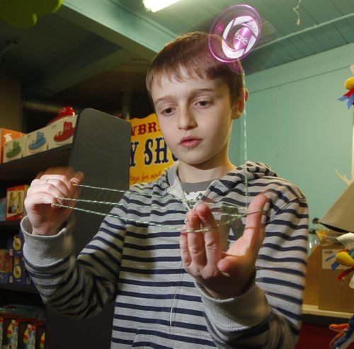 Newbridge Toy Store has started a yo yo night every Wednesday. Kids, teens and any adults interested in learning yo yo tricks are welcome to come down to the store and give 'er a try. In photo Leon Spivak does some tricks. BORIS MINKEVICH / WINNIPEG FREE PRESS  October 30, 2013