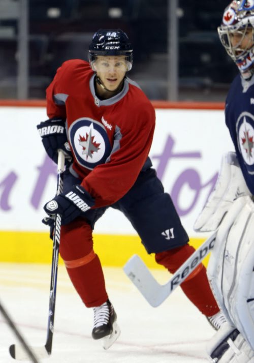 Winnipeg Jets Practice at the MTS Centre Äì ÄúToby ÄúTobias Enstrom has told his natinal team in Sweden he will not play at the Sochi Olympics in 2014 . Oct. 31 2013 / KEN GIGLIOTTI / WINNIPEG FREE PRESS