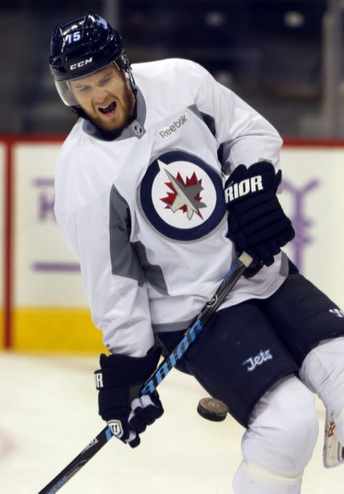 Winnipeg Jets Practice at the MTS Centre ÄìThat's gotta hurt  - #15 Matt Halischuk  gets hit during tip drill - Oct. 31 2013 / KEN GIGLIOTTI / WINNIPEG FREE PRESS