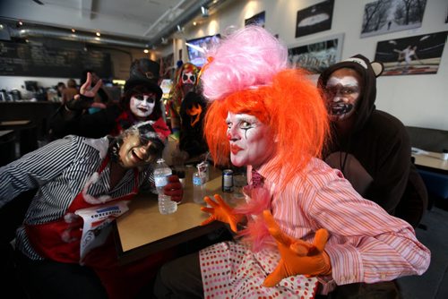 United Way employees from the community investment department  ham it up for the camera as they wait for their  lunch at the Free Press News Cafe while wearing  Halloween costumes with a circus theme Thursday over the lunch hour.  Standup photo October 31,,  2013 Ruth Bonneville / Winnipeg Free Press