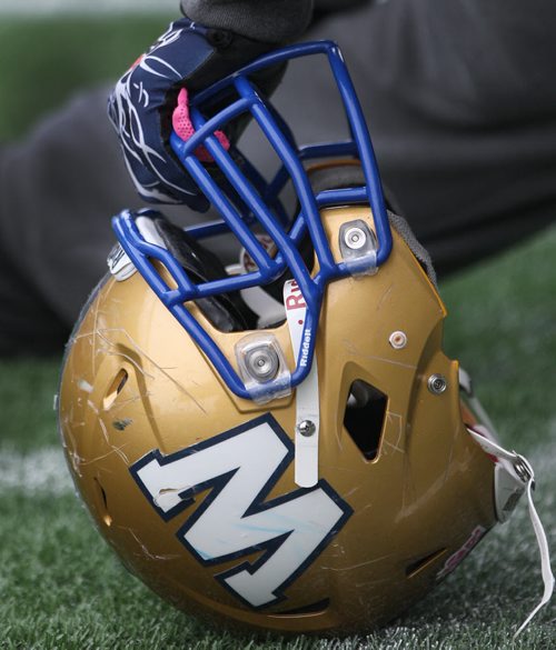 A Winnipeg Blue Bombers players sratched up helmet tells the story of the teams 2013 season- The team will play their final game of the 2013 season this Saturday against the Hamilton Tiger-Cats-  See Paul Wiecek story- Oct 31, 2013   (JOE BRYKSA / WINNIPEG FREE PRESS)