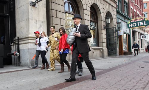 Co-workers make a quick run for coffee during a break dressed in halloween costumes on Main Street Thursday afternoon. (l-r) Chris Cadiz, Jen Goertzen, Micael Riediger, Andrea Thorsteinson, Cathy Hu and Stephen McKenzie. 131031 - October 31, 2013 MIKE DEAL / WINNIPEG FREE PRESS
