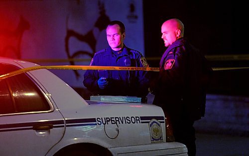 BORIS MINKEVICH / WINNIPEG FREE PRESS  070530 Crime scene on Selkirk Ave. near Andrews. Police hold the scene.