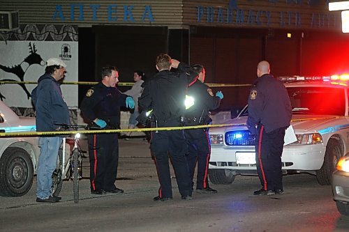 BORIS MINKEVICH / WINNIPEG FREE PRESS  070530 Crime scene on Selkirk Ave. near Andrews. Police hold the scene.