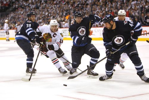 Winnipeg Jet #44 Bogosian tries to get the puck out of the Jets zone during the 1st period of play against the Chicago Blackhawks Saturday afternoon at MTS Centre. November 02,,  2013 Ruth Bonneville / Winnipeg Free Press