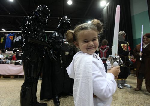 Five year old Chole Buhler is all smiles as she wears her Princess Leia  costume at Comic Con event  at the Convention Centre Saturday.  November 02,,  2013 Ruth Bonneville / Winnipeg Free Press