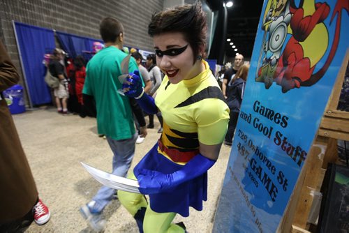 Christiana Jones hams it up as she wears her wolverine costume at Comic Con event  at the Convention Centre Saturday.  November 02,,  2013 Ruth Bonneville / Winnipeg Free Press
