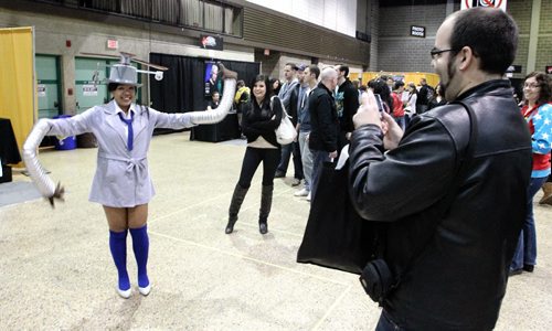 Jennifer Chua (left) dressed up as Inspector Gadget and spent the afternoon checking out the booths and getting her photograph taken by other attendees Sunday afternoon.  131103 - November 3, 2013 MIKE DEAL / WINNIPEG FREE PRESS