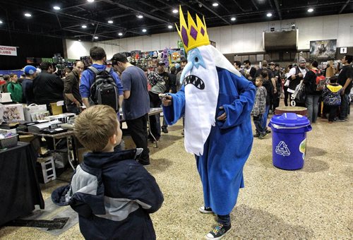 Jamie Derhak dressed up as the Ice King from the animated television show Adventure Time and spends most of her time being accosted by young children as she walks amongst the booths at Comic Con Sunday afternoon at the Convention Centre. 131103 - November 3, 2013 MIKE DEAL / WINNIPEG FREE PRESS