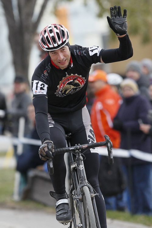 November 3, 2013 - 131103  - Terry Macyk (12) celebrates after winning the 40+ race in the 2013 Manitoba Cyclocross Championships at the Forks Sunday, November 3, 2013. John Woods / Winnipeg Free Press