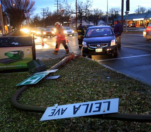 Winnipeg Police and Fire Fighters were at the scene after a vehicle struck the traffic light standard on Main St. at Leila Ave. Monday morning. No injuries and south bound Main St traffic was delayed for a short time. Wayne Glowacki / Winnipeg Free Press Nov. 4. 2013