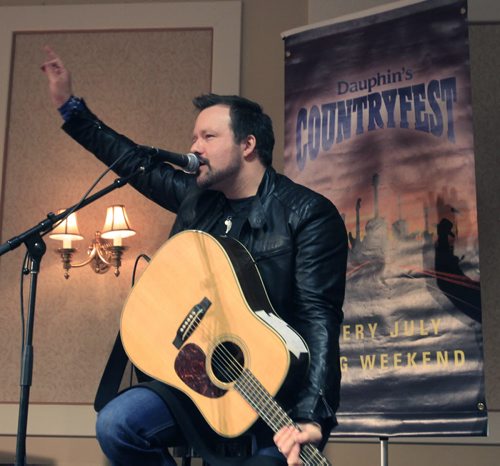 Deric Ruttan performs a few songs at an event Monday to announce the Dauphin's Countryfest 2014 Line-up. Deric will be performing at the up and coming festival June 26-29 along with Blake Shelton, The Band Perry, Nitty Gritty Dirt Band and Rascal Flatts . Al Small story.  Wayne Glowacki / Winnipeg Free Press Nov. 4. 2013