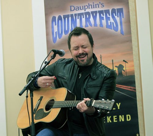 Deric Ruttan performs a few songs at an event Monday to announce the Dauphin's Countryfest 2014 Line-up. Deric will be performing at the up and coming festival June 26-29 along with Blake Shelton, The Band Perry, Nitty Gritty Dirt Band and Rascal Flatts . Al Small story.  Wayne Glowacki / Winnipeg Free Press Nov. 4. 2013