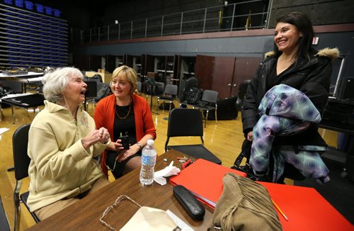 From left, Kay Tworek and her daughter, Glenlawn Collegiate community liaison worker Margaret Lapenskie, chat with playwright Rebecca Gibson during rehearsal on Mon., Nov. 4, 2013, for the Glenlawn Collegiate Remembrance Day production of ÄòPig DogÄô, which is based on the Second World War experiences of the 86-year-old Tworek whose Polish family harboured Royal Canadian Air Force pilot Jack Duggan. Photo by Jason Halstead/Winnipeg Free Press
