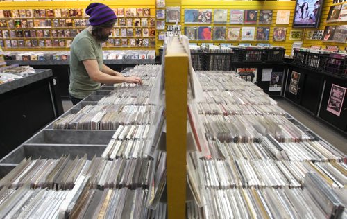 Music Trader. 97 Osborne Street Mgr. Jason Churko amid his stock.See Sanderson story story- Nov 05, 2013   (JOE BRYKSA / WINNIPEG FREE PRESS)