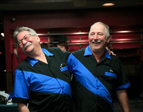 Darts teammates Bud Hawkins and Dan Cady laugh during a game at the St. James Legion off Portage Ave.  Legions story by Mary Agnes 131016 - Wednesday, October 16, 2013 - (Melissa Tait / Winnipeg Free Press)