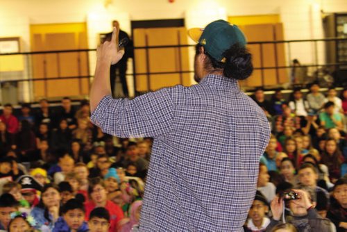 Canstar Community News Chris Tse speaks to hundreds of students at Arthur A. Leach School about Free The Children and how they can each make a positive difference in the world. (JORDAN THOMPSON)