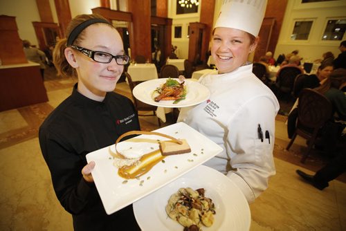 November 5, 2013 - 131105  -  Hayley McMurray (L), second year Hotel and Restaurant Management Student and Jessica Cuthbert, second year Culinary Arts student pose with Gnocchi with lemon basil cream sauce, mushrooms and toasted pine nuts, Teriyaki Game Hen with wild rice, baby bok choy and carrots, and Pumpkin Panna Cotta with sour cream ice cream and pumpkin caramel sauce at Jane's Restaurant Tuesday, November 5, 2013. John Woods / Winnipeg Free Press