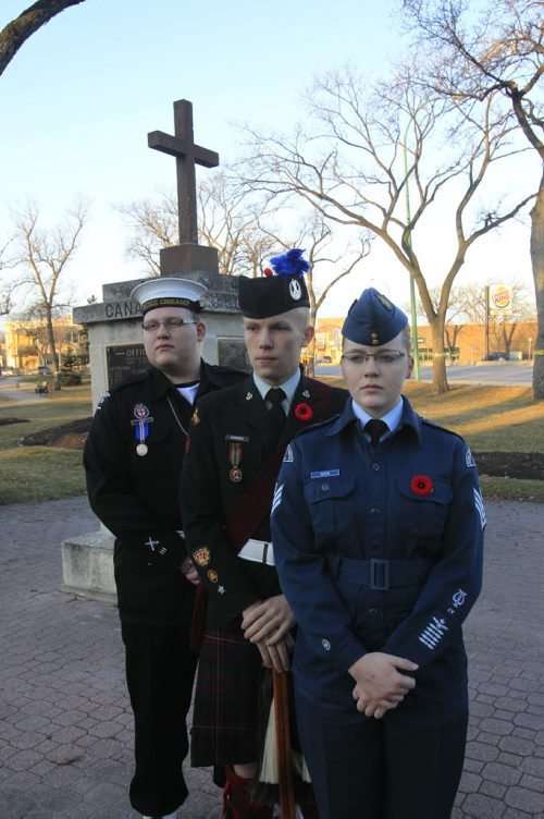 49.8 Photo Page.  Three cadets at the monument at Vimy Ridge Park. From right to left Cadet Flt. Sgt. Colleen Soos, Cadet Master Warrant Officer Zach Summers and Cadet Chief Petty Officer, 2nd class Matthew Vinck. Wayne Glowacki / Winnipeg Free Press Nov. 7. 2013