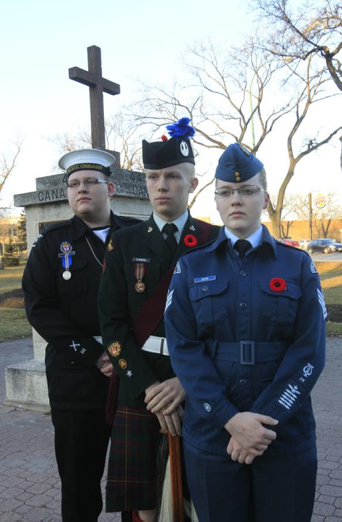49.8 Photo Page.  Three cadets at the monument at Vimy Ridge Park. From right to left Cadet Flt. Sgt. Colleen Soos, Cadet Master Warrant Officer Zach Summers and Cadet Chief Petty Officer, 2nd class Matthew Vinck. Wayne Glowacki / Winnipeg Free Press Nov. 7. 2013