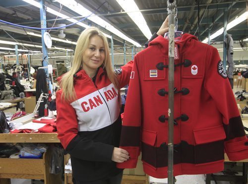 Marissa Freed with Freed & Freed International Ltd. wearing one of the styles of  the Canadian Olympic team's outwear they have made. Gord Sinclair  story Wayne Glowacki / Winnipeg Free Press Nov. 7. 2013
