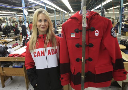 Marissa Freed with Freed & Freed International Ltd. wearing one of the styles of  the Canadian Olympic team's outwear they have made. Gord Sinclair  story Wayne Glowacki / Winnipeg Free Press Nov. 7. 2013