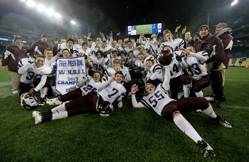 The St.Paul's Crusaders AA football team celebrates their Free Press Bowl Championship victory over the Garden City Fighting Gophers by a score of 32-0 at Investors Group Field, Friday, November 8, 2013. (TREVOR HAGAN/WINNIPEG FREE PRESS)