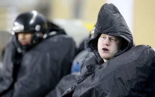 A member of the Garden City Gophers AA football team looks on from the bench during a 32-0 defeat at the hands of the St.Pauls Crusaders during the Free Press Bowl Championship at Investors Group Field, Friday, November 8, 2013. (TREVOR HAGAN/WINNIPEG FREE PRESS)