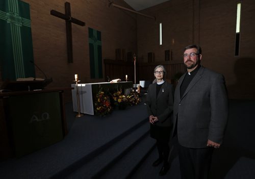 Faith Page -St. Chad's Anglican Church is leaving the ecumenical partnership  at the Assiniboia Christian Centre  for financial reasons  . Blessed John XXIII RC parish  has purchased the Anglican share of the building Äì left Rev. Susan Titterington  of St. Chad's  and right Rev. Gerald Langevin of Blessed John  XXIII  RC Parish   in photo   Nov. 12 2013 / KEN GIGLIOTTI / WINNIPEG FREE PRESS