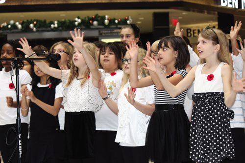 Canstar Community News cole Centrale School's choir sang songs and read "In Flanders Fields."