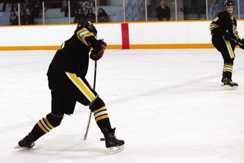 Canstar Community News The Gophers' Noah Skorpad fires a wrist shot from the point. (JORDAN THOMPSON)