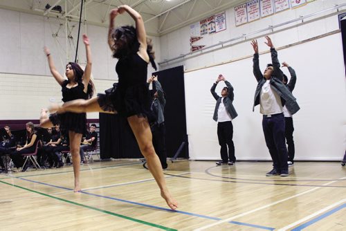 Canstar Community News Kildonan East Collegiate's dance troupe performs a contemporary/lyrical piece to Coldplay's "Atlas" during the high school's Remembrance Day ceremony Thursday morning. (JORDAN THOMPSON)