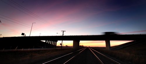 Road over rails on the west perimeter is defined by a prairie sunset Tuesday evening, weather for tomorrow is.....November 12, 2103 - (Phil Hossack / Winnipeg Free Press)
