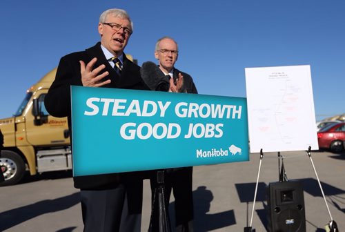 Premier Greg Selinger and Minister Steve Ashton announcing a major upgrade to highway 75 at Bison Trucking, Wednesday, November 13, 2013. (TREVOR HAGAN/WINNIPEG FREE PRESS)