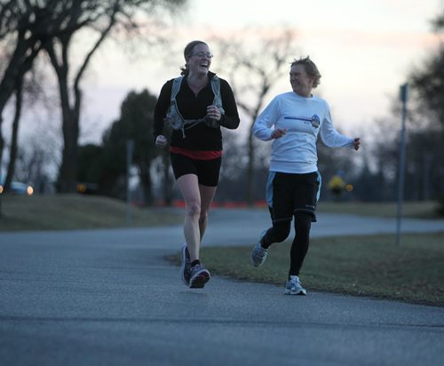 Tara Kenny (shorts) and her running partner Amy Campbell enjoy a late afternoon jog in Assiniboine Park  on a balmy  November afternoon Wednesday. November 13,,  2013 Ruth Bonneville / Winnipeg Free Press