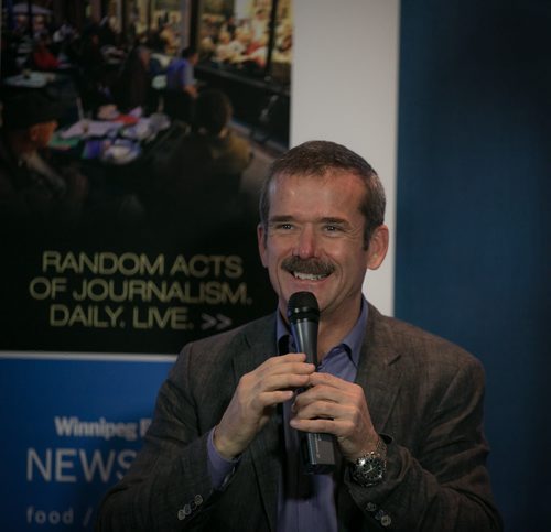 Col. Chris Hadfield laughs while discussing space flight at a packed Winnipeg Free Press News Café on Wednesday. The Canadian Astronaut gained fame aboard the International Space Station at the beginning of 2013. 131113 - Wednesday, November 13, 2013 - (Melissa Tait / Winnipeg Free Press)