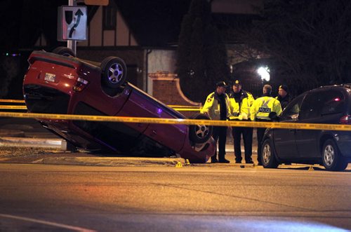 MVC roll over at the intersection of Waverly and Lindenwood Drive. BORIS MINKEVICH / WINNIPEG FREE PRESS  November 13, 2013
