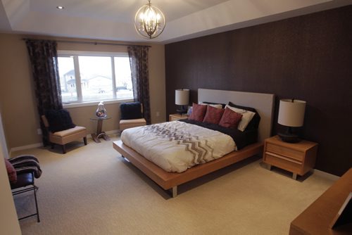 Homes. The master bedroom in 175 Lake Bend Road, a Kensington Homes show home. The sales rep. is Sabie Brar. Todd Lewys story   Wayne Glowacki / Winnipeg Free Press Nov. 14. 2013