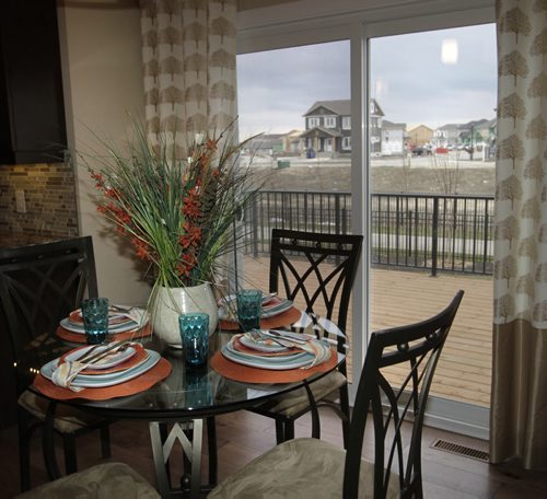 Homes. Eating area by backyard deck at 175 Lake Bend Road, a Kensington Homes show home. The sales rep. is Sabie Brar. Todd Lewys story   Wayne Glowacki / Winnipeg Free Press Nov. 14. 2013